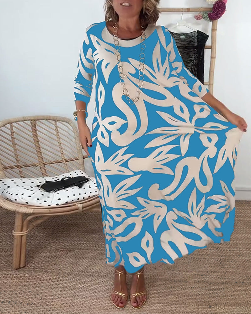 Élégance Amandine – Printed round neck dress with long sleeves