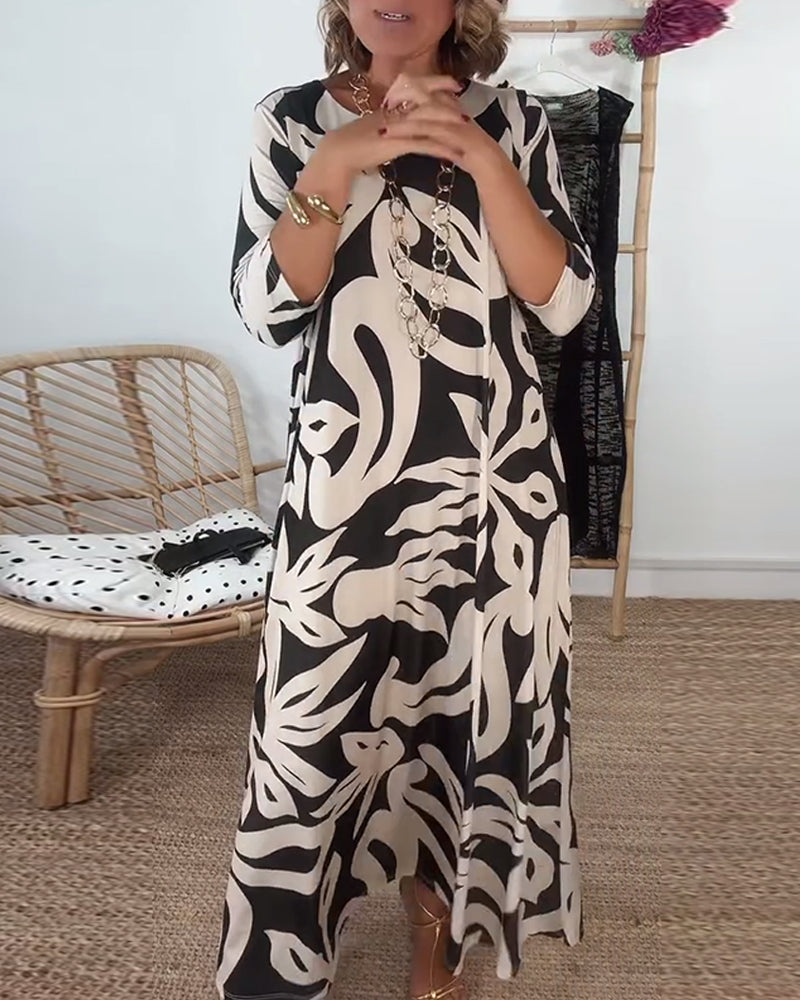 Élégance Amandine – Printed round neck dress with long sleeves