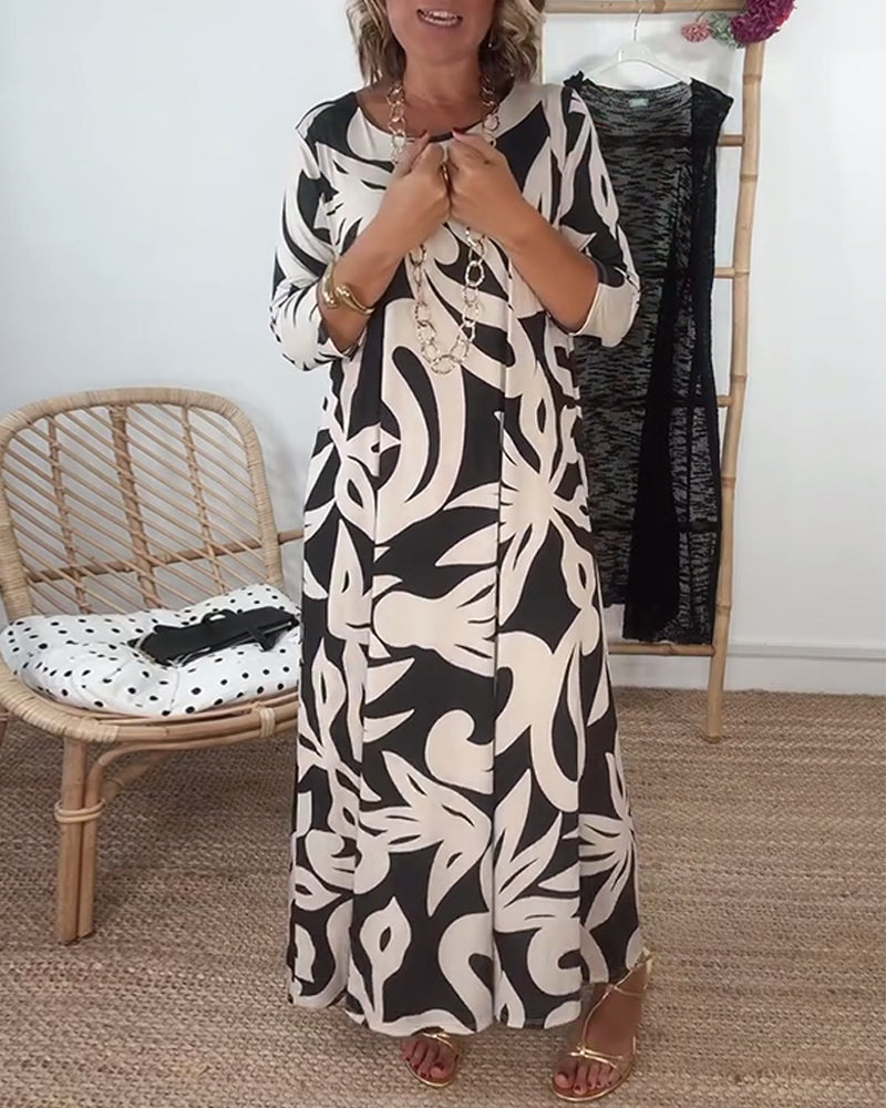 Élégance Amandine – Printed round neck dress with long sleeves