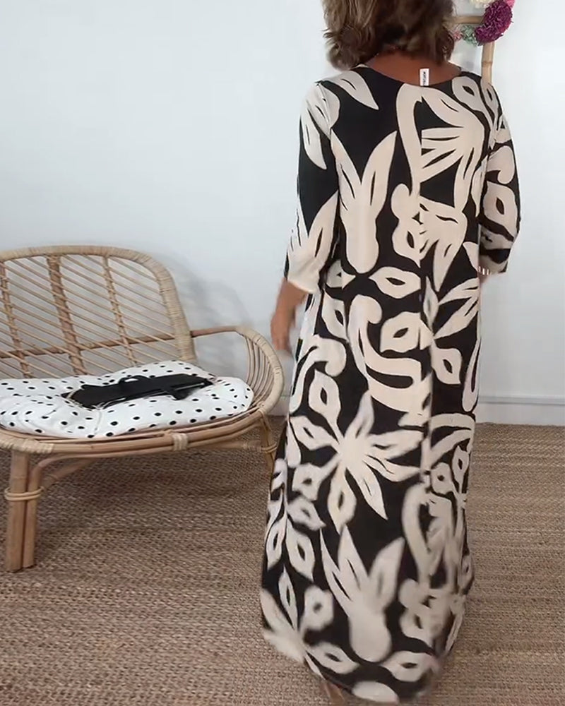 Élégance Amandine – Printed round neck dress with long sleeves