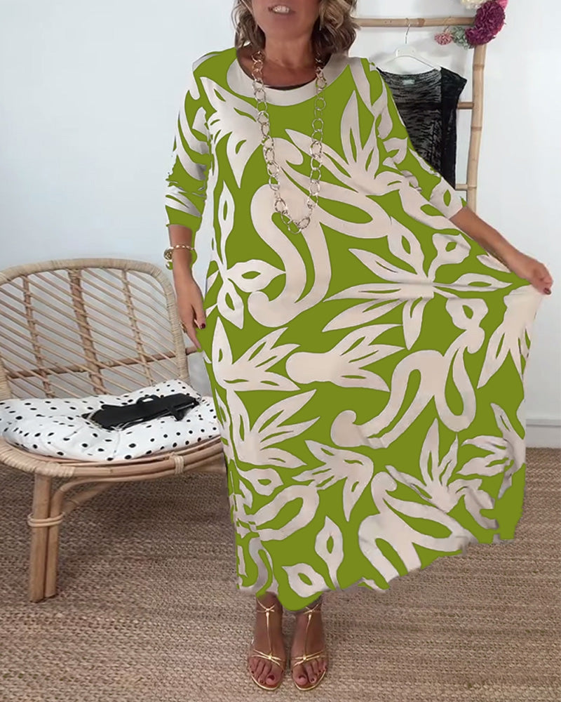 Élégance Amandine – Printed round neck dress with long sleeves