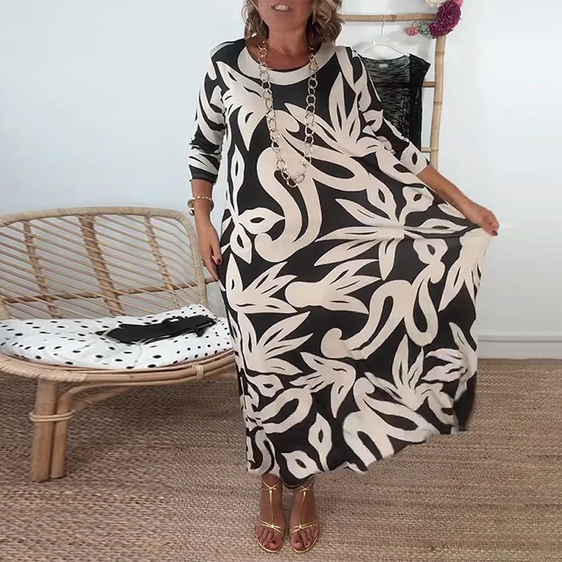 Élégance Amandine – Printed round neck dress with long sleeves